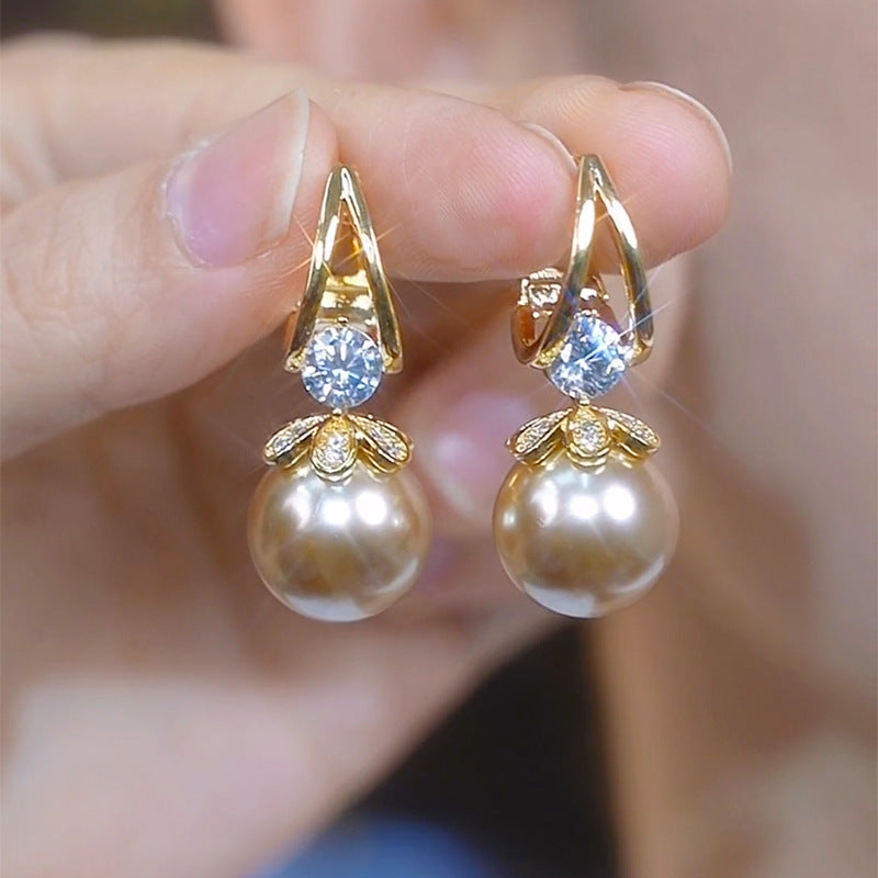 ❤️【Compra uno y llévate otro gratis】❤️Exquisitos pendientes de perlas con temperamento
