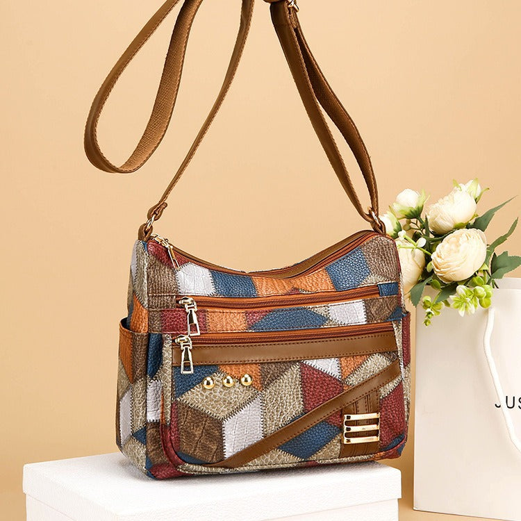 👜Bolso de hombro versátil de gran capacidad a cuadros tridimensional con bloques de color de cuero suave de PU a la moda para mujer