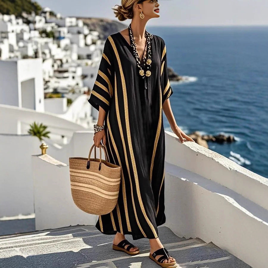 🥻【50% popusta】🌴🤍💙【S-5XL】Ova prekrasna haljina savršena je za ljetni bijeg. Duga i lepršava, elegantna je i savršena za šetnju plažom ili večernji izlazak.