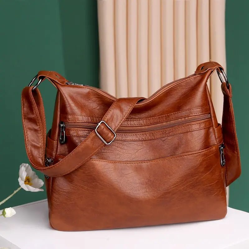 👜【Oferta ograniczona czasowo】Nowa modna torba na ramię z miękkiej skóry 2026, pojemna, odporna na zużycie, prawdziwa skóra