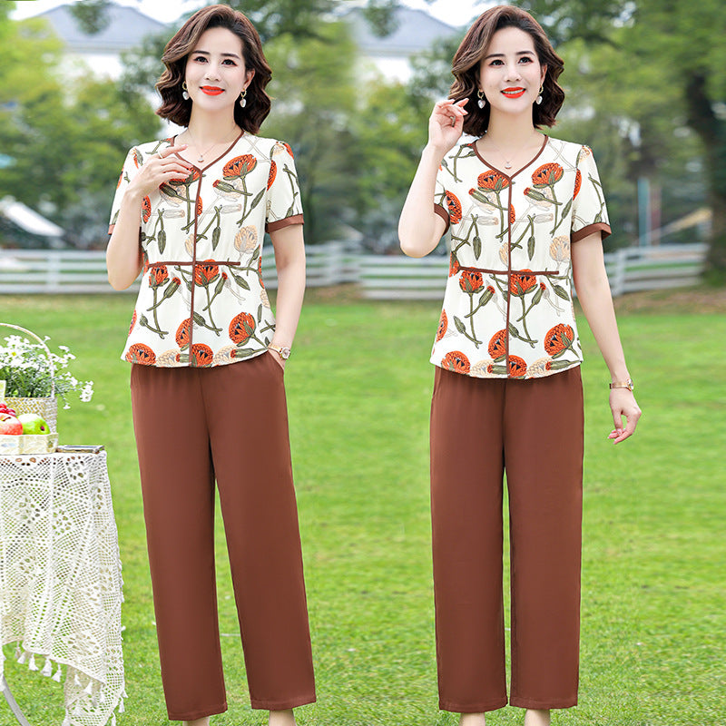 👚 【Rozmiary L-4XL】Zestaw casualowy z nadrukiem lotosu – wygoda i elegancja na letnie dni