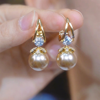 ❤️【Compra uno y llévate otro gratis】❤️Exquisitos pendientes de perlas con temperamento