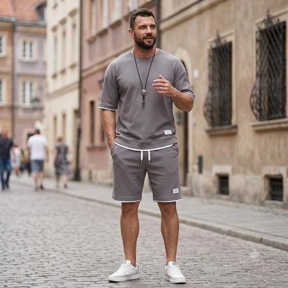 🔥😎【Nowość!✨】【Koszulka + spodenki】Męski, oddychający zestaw sportowy, stylowy i swobodny, idealny na lato.