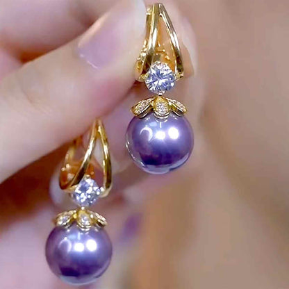 ❤️【Compra uno y llévate otro gratis】❤️Exquisitos pendientes de perlas con temperamento