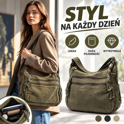 👜✨ Pojemna torba na ramię z płótna o efekcie postarzenia: wyróżnia się wielokomorową konstrukcją z zapięciami na suwak oraz szerokim, regulowanym paskiem.