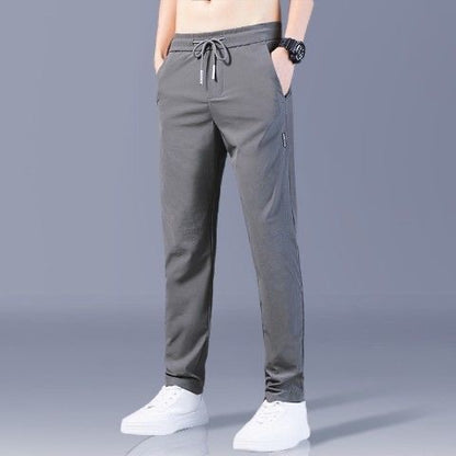 【M-5XL】2025 nuevos pantalones elásticos casuales para hombre, cómodos y de moda.