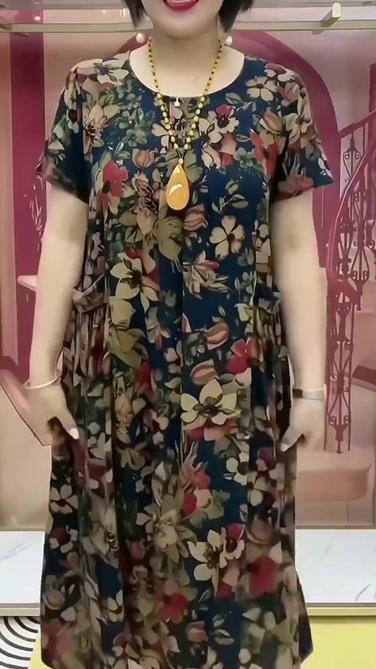 👗【XL-6XL】Luźne sukienki w kwiaty w rozmiarze plus rozmiar, Wygląda szczupło, a jej brzuch jest zakryty