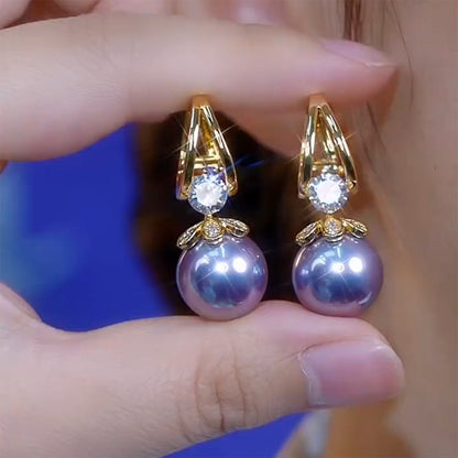 ❤️【Compra uno y llévate otro gratis】❤️Exquisitos pendientes de perlas con temperamento