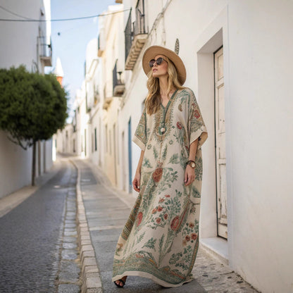 🥻【50% popusta】🌴🤍💙【S-5XL】Ova prekrasna haljina savršena je za ljetni bijeg. Duga i lepršava, elegantna je i savršena za šetnju plažom ili večernji izlazak.