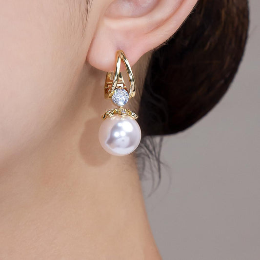 ❤️【Compra uno y llévate otro gratis】❤️Exquisitos pendientes de perlas con temperamento