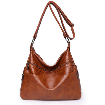 👜【Oferta ograniczona czasowo】Nowa modna torba na ramię z miękkiej skóry 2026, pojemna, odporna na zużycie, prawdziwa skóra